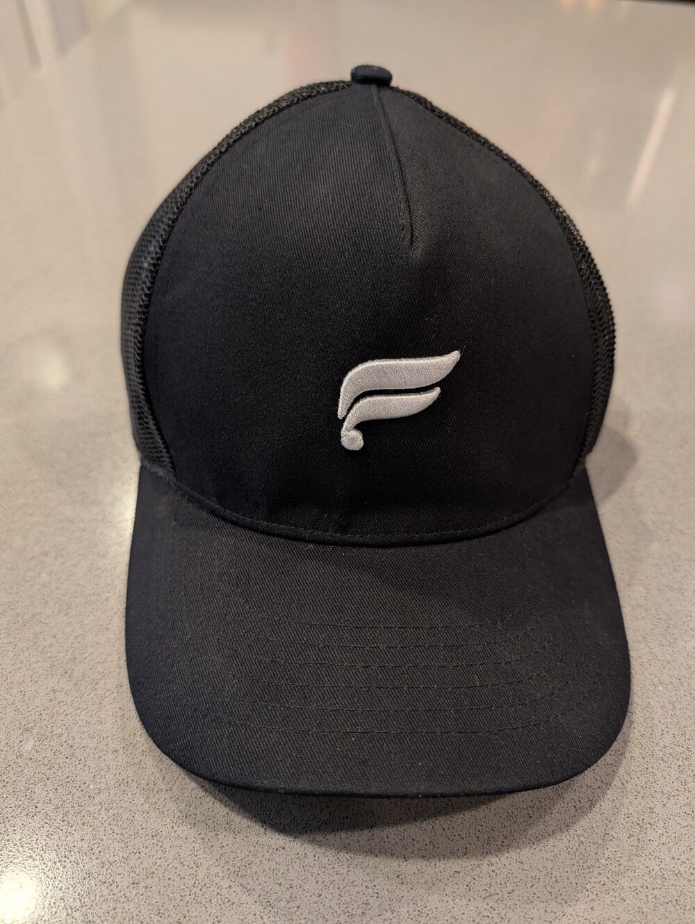 Fabletics Black Mesh Trucker Hat with White Logo